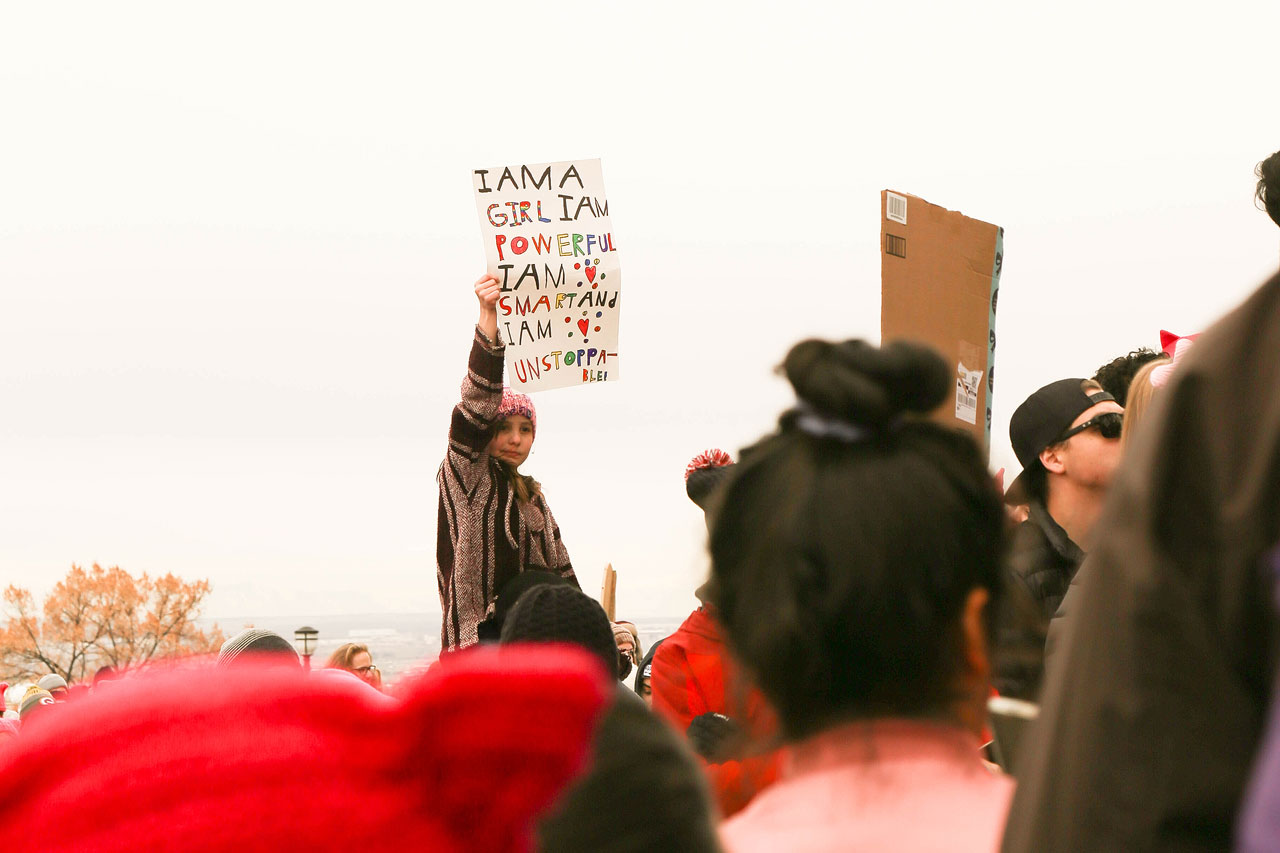 Women’s March 2019: A student-led movement I am a girl sign