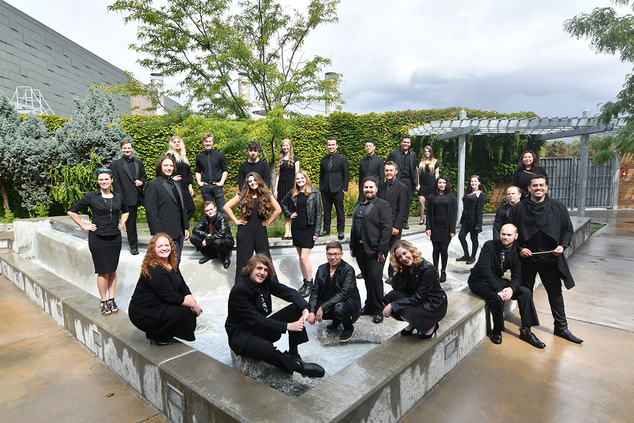 SLCC’s chorale showcase is ‘evoking the cosmos’ group of people wearing formal clothes