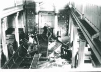 Toppled furniture and pews inside a synagogue