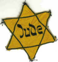 "Jude" written on cloth Jewish star