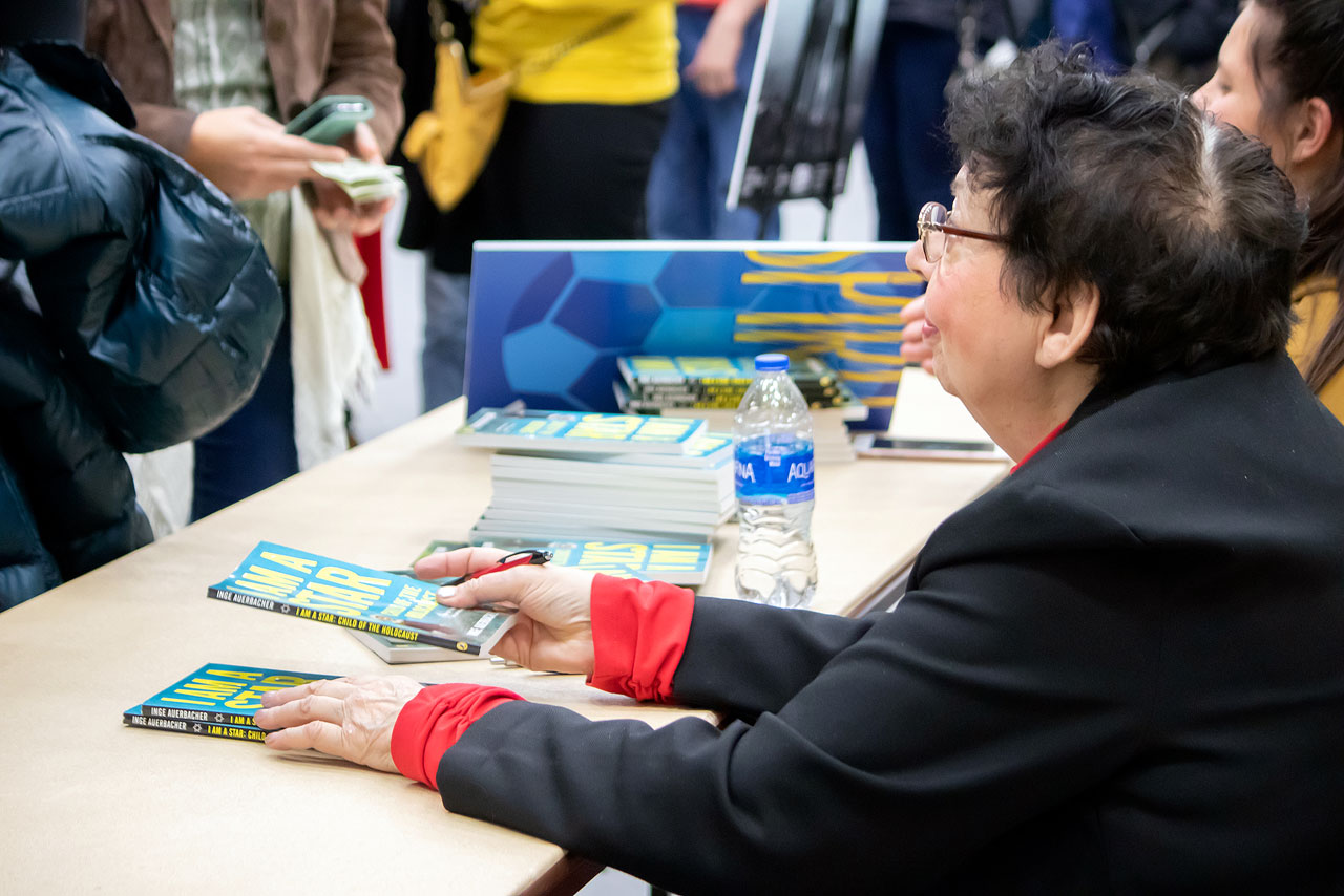 Inge Auerbacher shares her story of survival Inge Auerbacher sings copies of her book