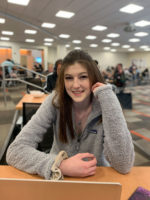 Jane smiles in the South City commons area