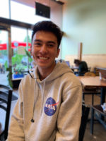 Josh wears a NASA hooded sweatshirt