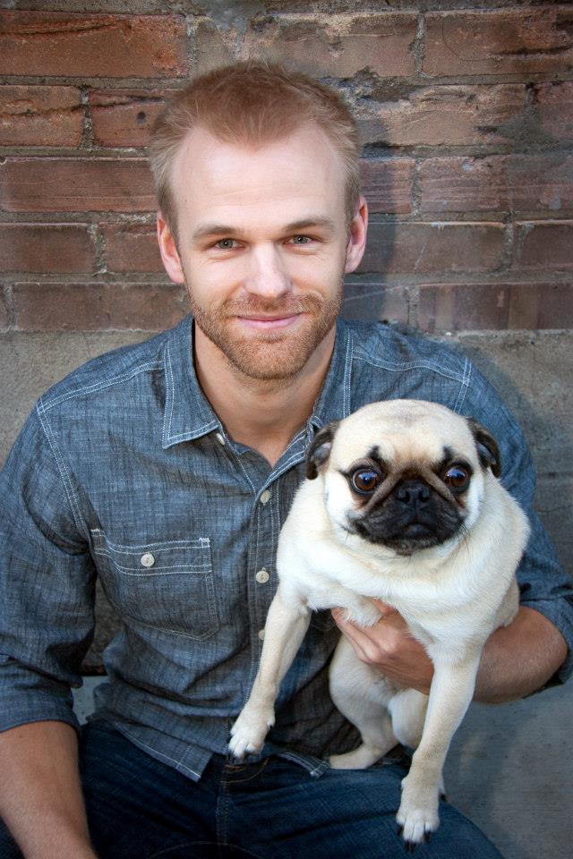 Train Walk Poop: Happy dogs equal happy owners Ryan holding a pug