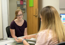 Taking the stress out of choosing a major Student meets with an advisor