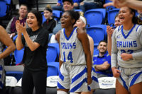 SLCC players show excitement on the bench