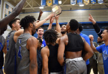 SLCC basketball finds success under first-year coaches Hoisting the playoff plaque