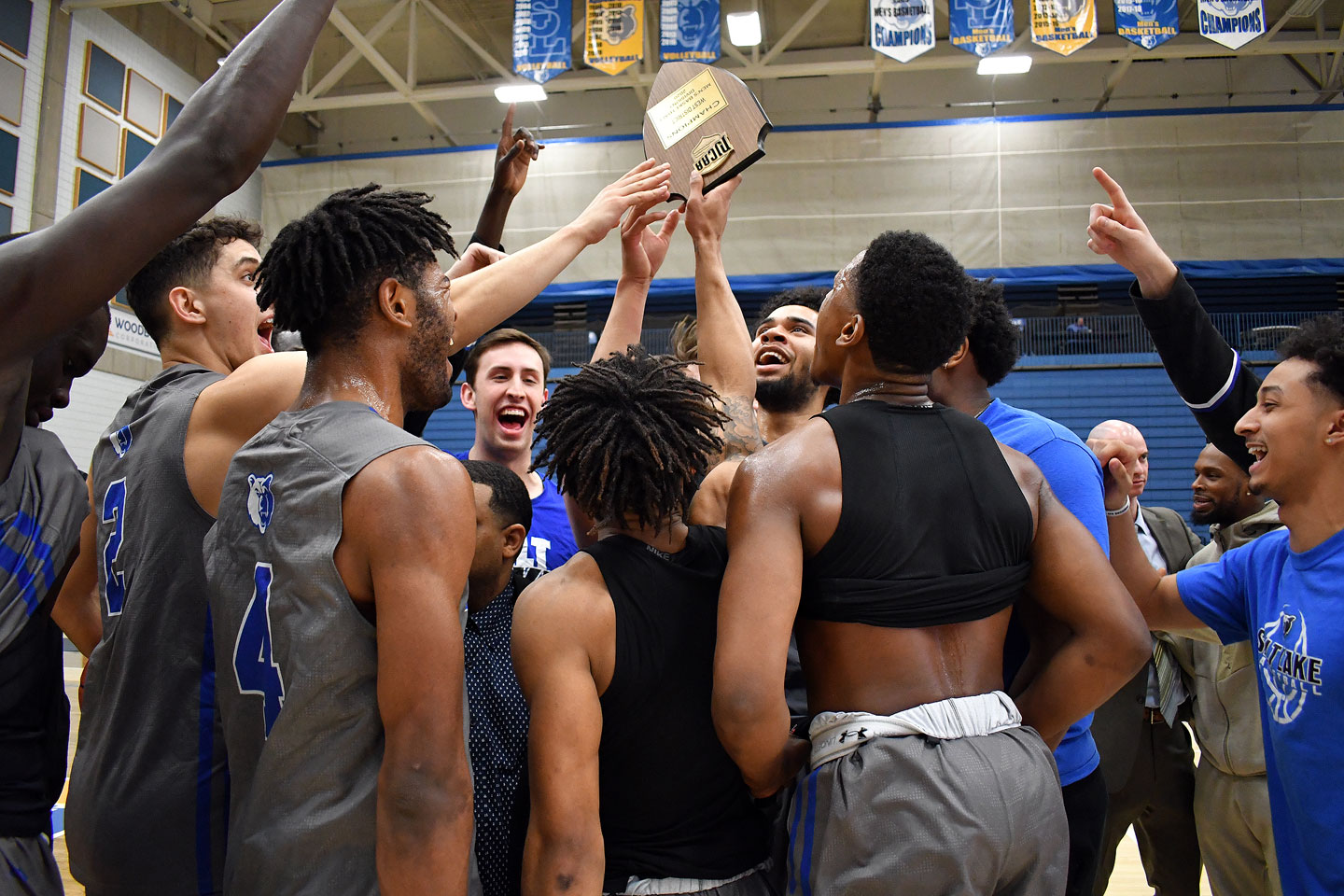 SLCC basketball finds success under first-year coaches Hoisting the playoff plaque