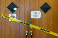 Caution tape restricts entry to Grand Theatre