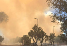 Fire breaks out at Taylorsville Redwood Campus Orange-tinged sky