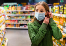 Gov. Herbert approves mask mandates in Salt Lake, Summit counties Woman wearing mask in a store