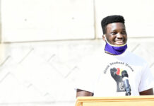 Black Student Union tackles racial injustice Close-up of Wisdom Agbabli at podium