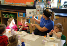 Back to school: Child care at SLCC Storytime during breakfast