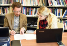 Questions about tutoring? SLCC has answers Writing Center tutor advises a student