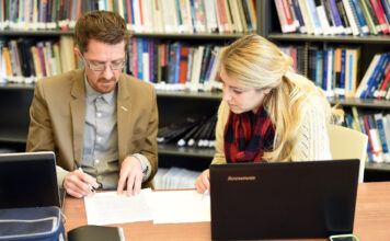 Questions about tutoring? SLCC has answers Writing Center tutor advises a student