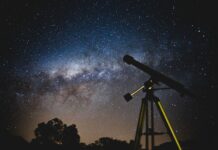 Astronomy course offers understanding of our universe Black telescope under blue and black sky