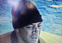 Robbery reported at Taylorsville Redwood Campus Polynesian man wearing brown coat and black beanie