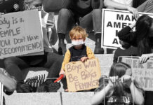 Salt Lake City Women’s March amplifies hundreds of voices Young boy holds sign that reads "Boys will be feminist"