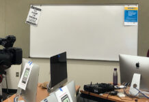 SLCC professors adjust during pandemic Alison wearing a mask while teaching