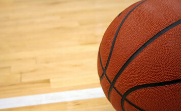 SLCC basketball teams play scrimmages before seasons begin in January Basketball on hardwood floor