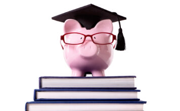 Breaking down SLCC student tuition Piggy bank stands on top of three books