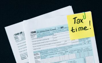 SLCC finance course prepares students for tax season "Tax time!" sticky note with 2020 tax forms