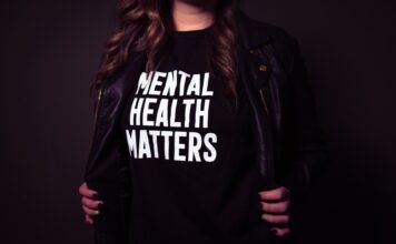 Taking a look at mental health Woman wears t-shirt that reads "mental health matters"