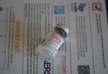 COVID-19 booster shots may be necessary A vial of the Moderna COVID-19 vaccine