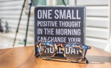 Mental health: Small changes can make a big difference Glasses with sign that reads "One small positive thought in the morning can change your whole day"