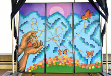 ‘We wanted to share our story’: Why SLCC commissioned a Latinx mural Mural of hands releasing butterflies