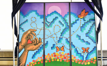 ‘We wanted to share our story’: Why SLCC commissioned a Latinx mural Mural of hands releasing butterflies