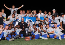 SLCC sports roundup: Banner season for Bruin soccer SLCC men's soccer team photo with championship trophy