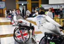 SLCC student prepares for Paralympic Games in Tokyo Fencing between two opponents in wheelchairs