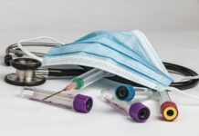 The effects of COVID-19 persist for several, including two SLCC English professors Vials, mask and a stethoscope rest on a surface