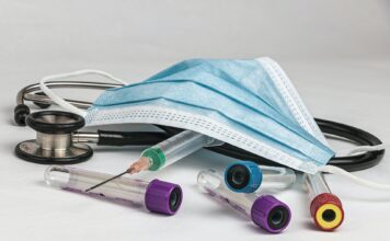 The effects of COVID-19 persist for several, including two SLCC English professors Vials, mask and a stethoscope rest on a surface