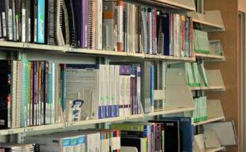 Curbing the expense of college textbooks Health textbooks on shelves at Jordan Campus