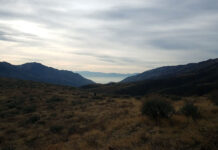 Worst air in the world: How SLCC students and staff feel about SLC’s air quality A view of two mountains coming together to create a canyon where thick pollution hangs in the air over Salt Lake City