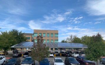 SLCC reduces costs by working toward environmental sustainability South view of solar carport at Redwood