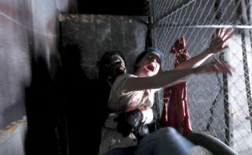 SLCC psychology professor explains why people like to be scared Haunted house worker scares a patron at Fear Factory