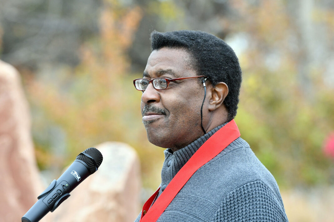 David Sanders at the podium