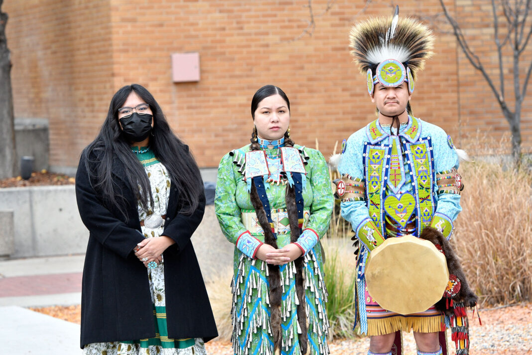 Acaysha Jones, left, Rocklyn Merrick and Eric Watchman, right