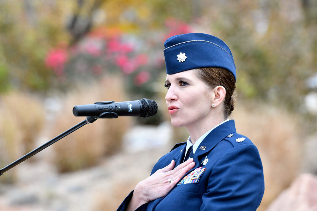 Lt. Col Sara Reed at the podium
