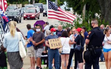 Kyle Rittenhouse acquitted: Students react A Kyle Rittenhouse supporter in Kenosha Wisconsin standing near Bradford High School