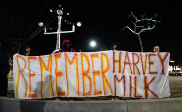 SLCC students gather to remember Harvey Milk Banner reads "Remember Harvey Milk"