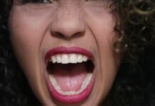 School’s response to racial incident divides Utah community Still image of a woman screaming