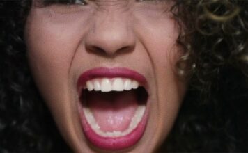 School’s response to racial incident divides Utah community Still image of a woman screaming