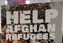 Utah’s response to the call for refugee acceptance "Help Afghan Refugees" poster at South City Campus