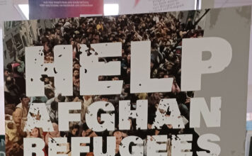 Utah’s response to the call for refugee acceptance "Help Afghan Refugees" poster at South City Campus