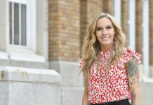 2021 Graduate of Excellence draws on past to build a brighter future Rachel Santizo stands beside a brick building