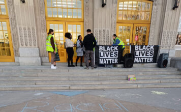 SLCC community holds solidarity event following racist message at South City Campus Chalk writing on sidewalk in front of entrance to South City Campus